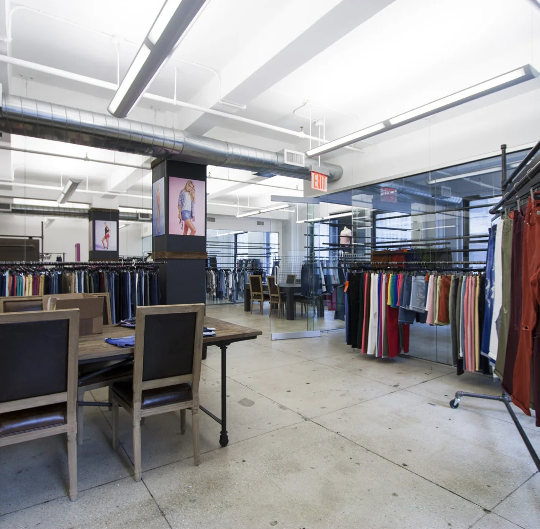Open workplace with globe pendant lighting and low workstations